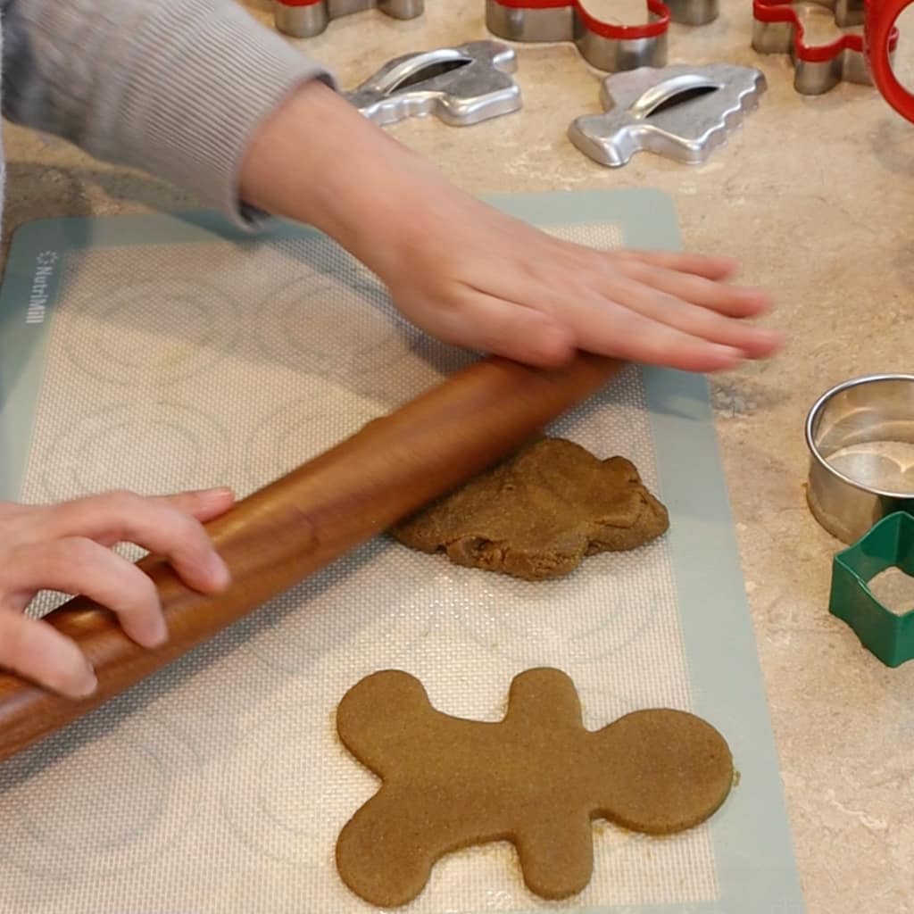 Rolling gingerbread cookies made with fresh milled flour